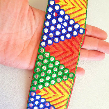 Red Mirrored Fabric Trim With Yellow, Orange , Green And Blue Embroidery With Mirrors